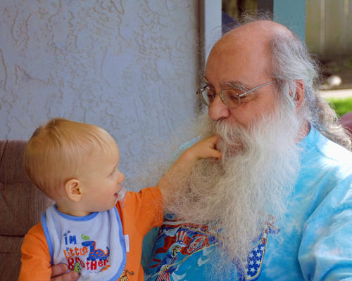 Grandson meets grandpa